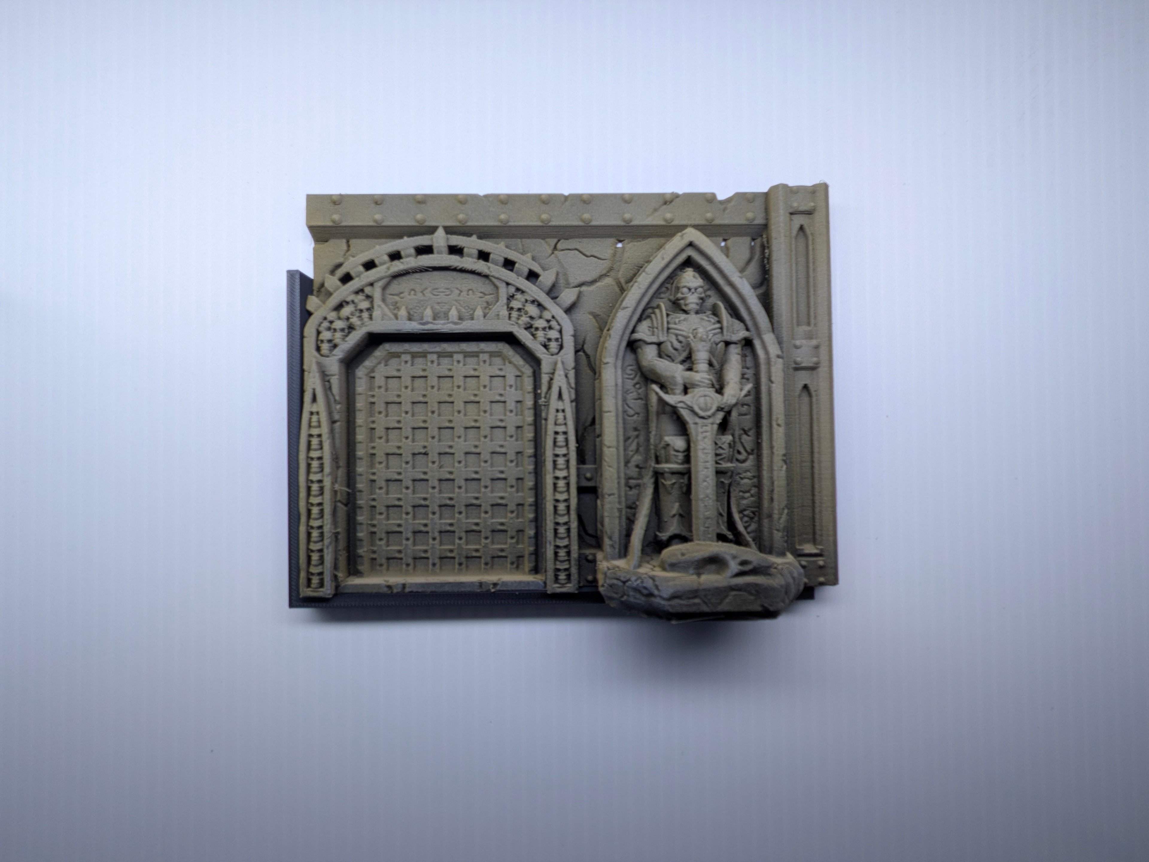 Decorative wall piece with architectural design on a plain background