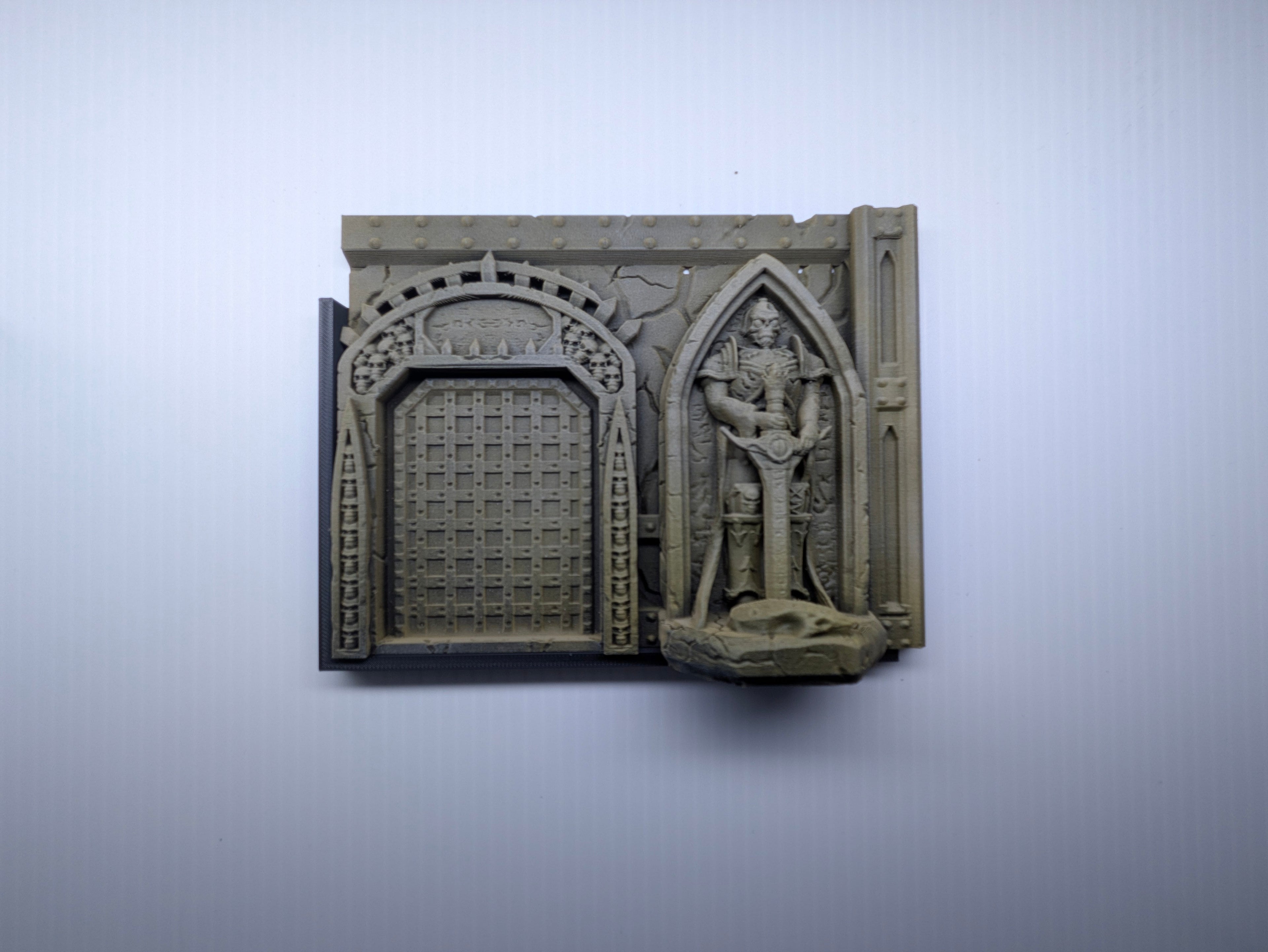 Decorative wall piece with architectural design on a light gray background