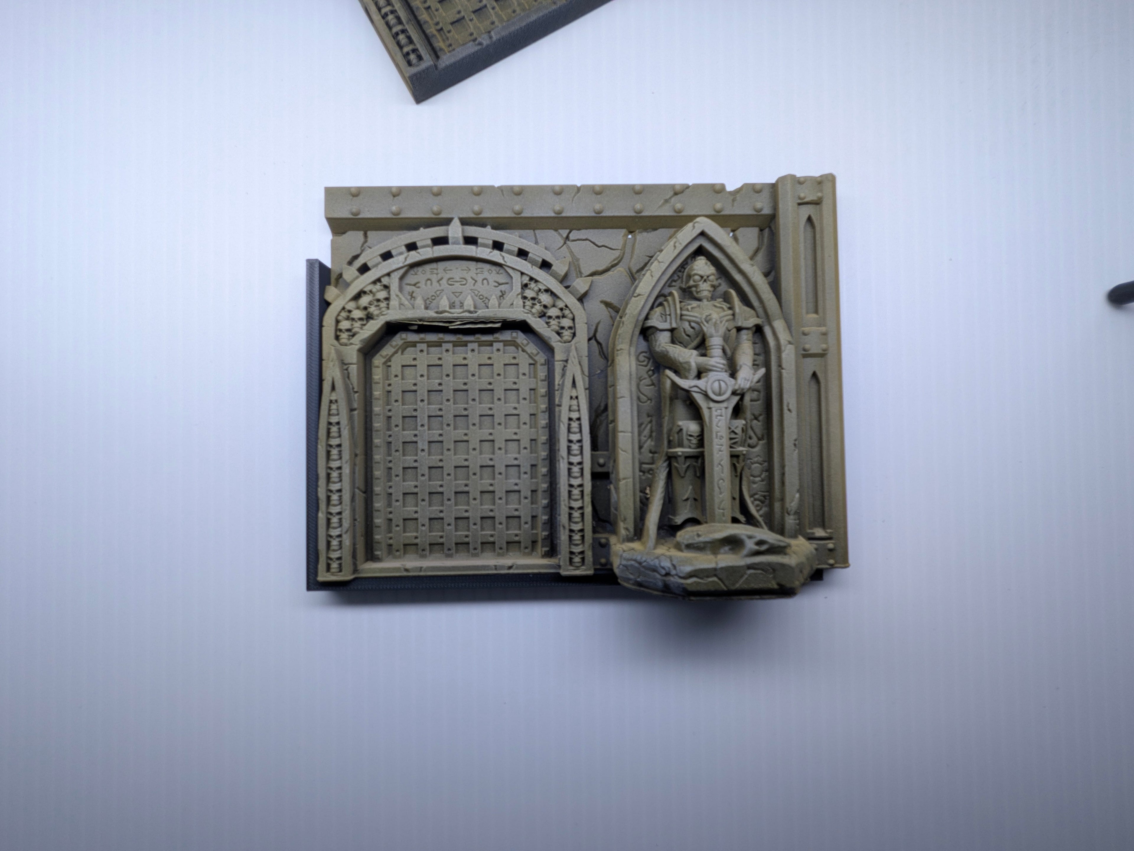 Decorative book with architectural design on a plain background